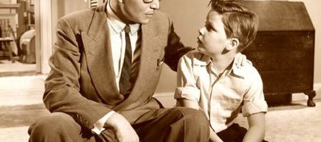 Generic 1960s pic of a father and son scene.